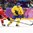 SOCHI, RUSSIA - FEBRUARY 14: Sweden's Gabriel Landeskog #92 controls the puck against Switzerland's Mark Streit #7 during men's preliminary round action at the Sochi 2014 Olympic Winter Games. (Photo by Andre Ringuette/HHOF-IIHF Images)